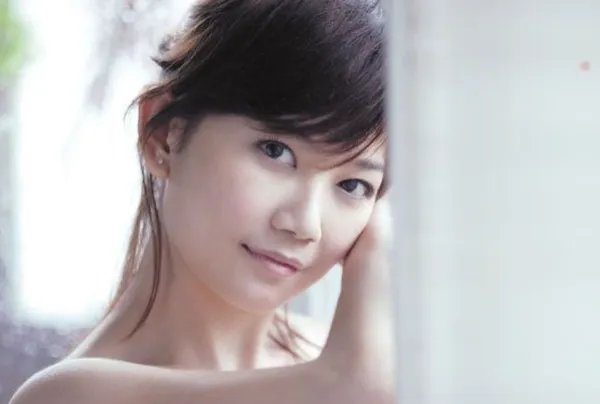 为什么许多人都会以为梁静茹是中国人？