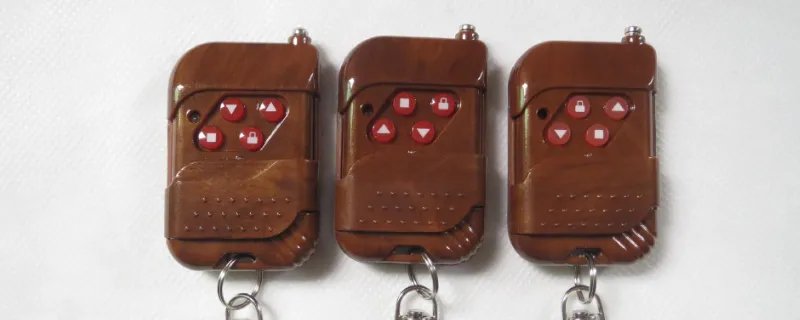 电动卷帘门遥控器怎么用